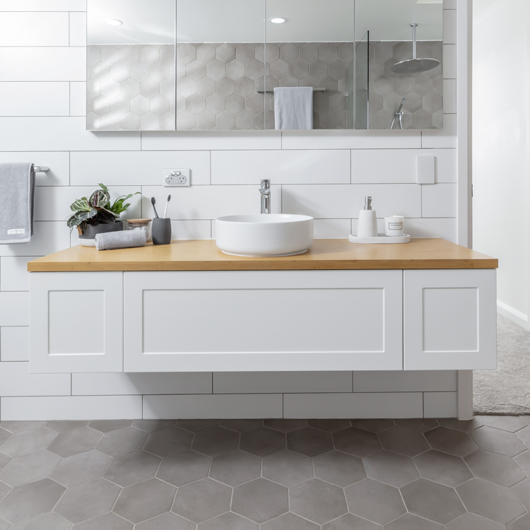 vanity basin and additional storage cabinets