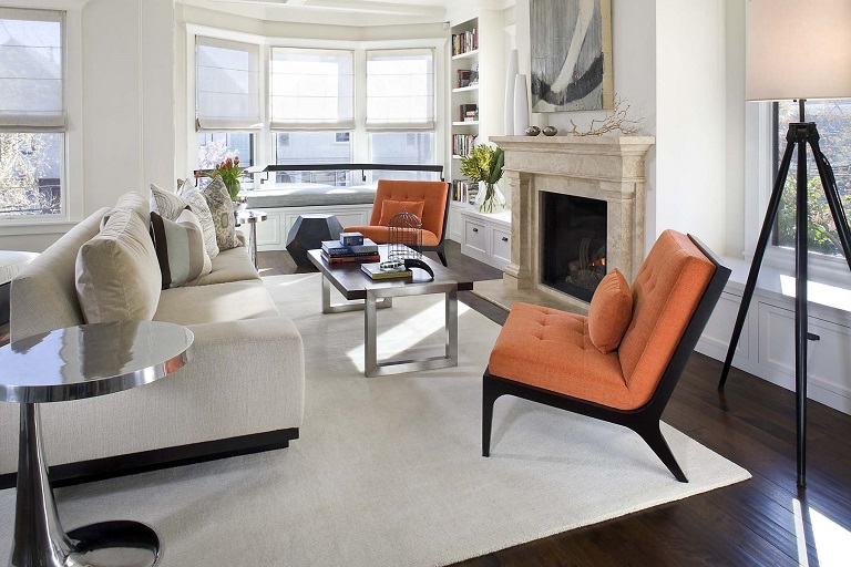 Orange accent chairs in a living room