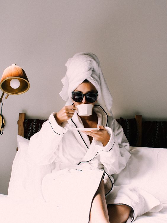 woman-wearing-a-white-bathrobe-and-drinking-coffee.jpg