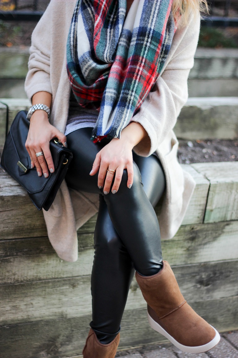 picture of person wearing stylish outfit with ECCO shoes sitting outside