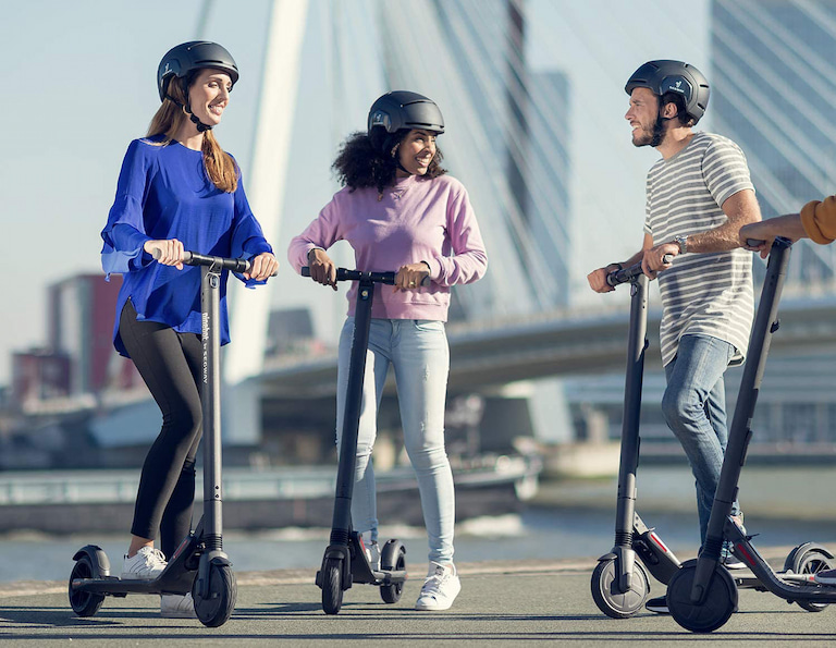 Teenagers and Adults on Scooters
