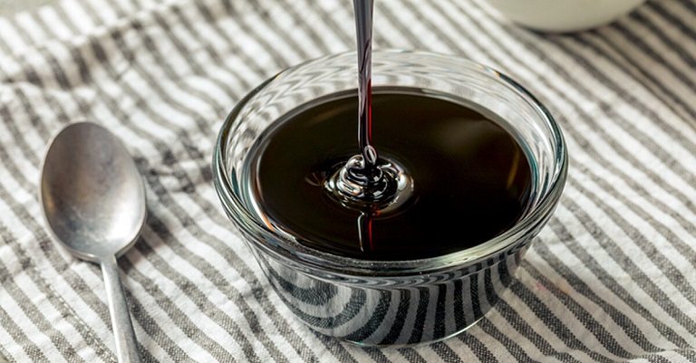molasses in bowl as liquid sweetener 