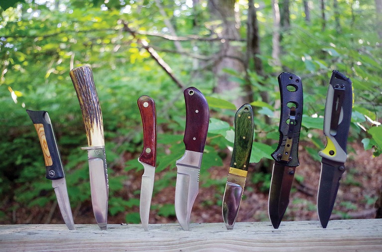 close-up of different types of hunting knives