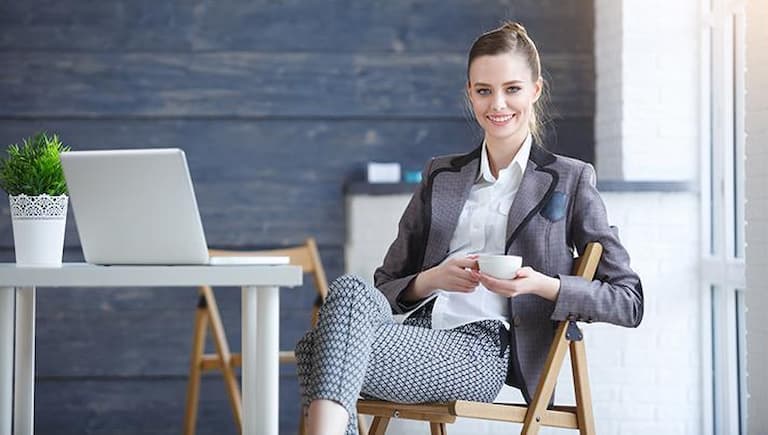 woman wearing fashionable gray business wear