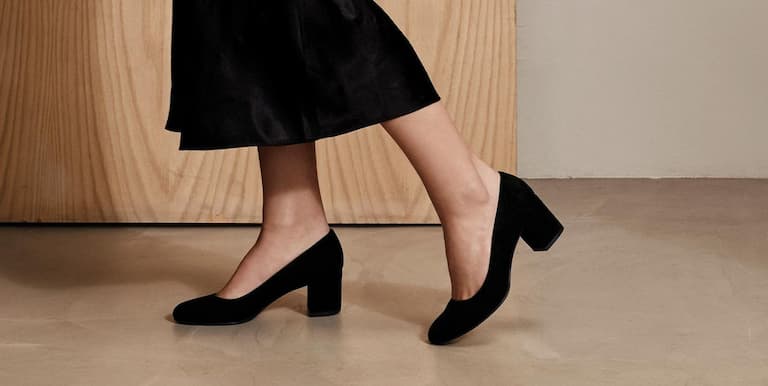 woman wearing black business casual high heels 