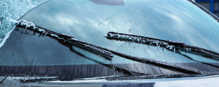 Washing car windscreen with wipers