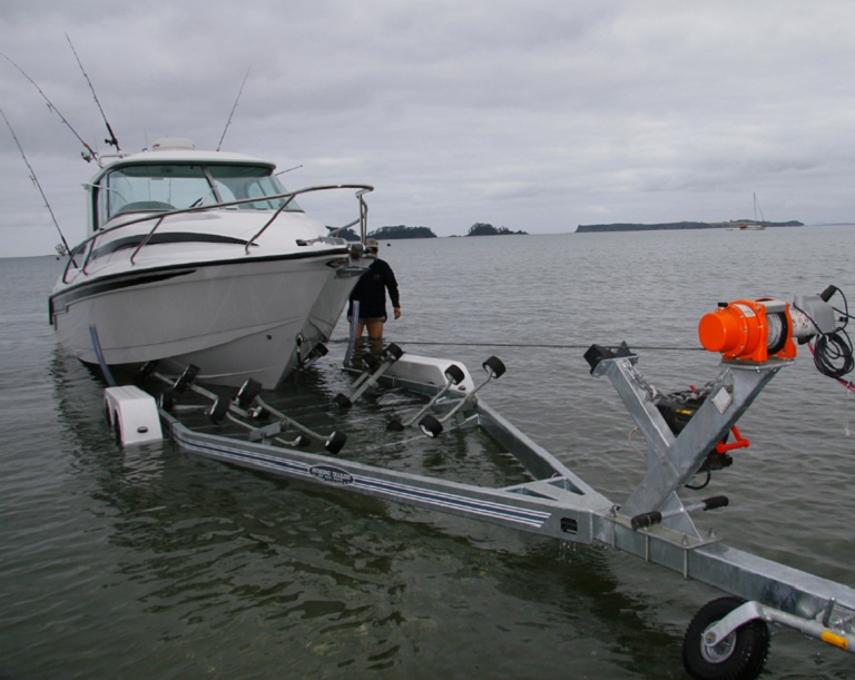 loading boat on a trailer with a boat winch electric