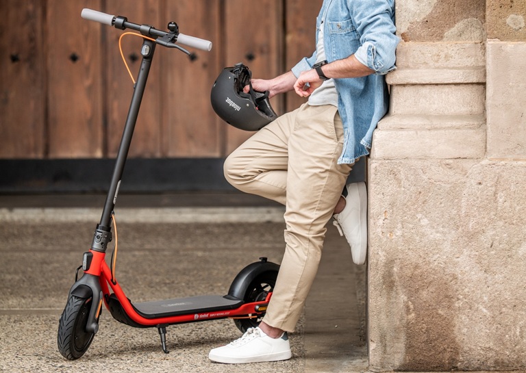 man and his e-scooter