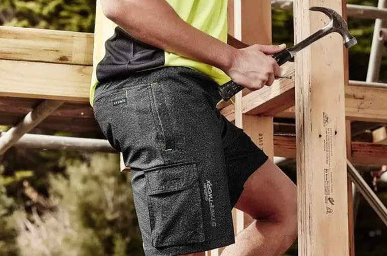 man wearing workwear shorts